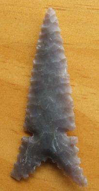 Made by flint knapping pressure flaking -- an arrowhead of Edwards Plateau Flint from Texas -- 2007 A.D.